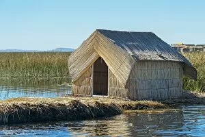Reed hut, floating islands of the Uros on Lake Titicaca, Puno, Peru