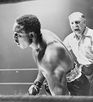Counting Prints: Referee Counting as Boxer Archie Moore Falls