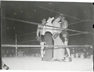 Referee and Others Examining John Henry Lewis Head