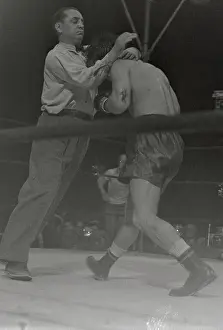 Referee Restraining Boxer Rocky Graziano
