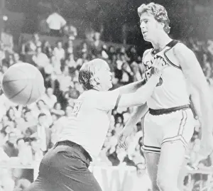 Referee Restraining Dave Cowens During Basketball Game