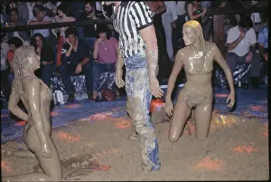 Referee Separates Mudwrestlers