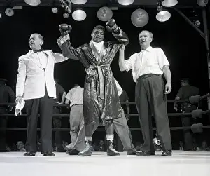 Trainer Prints: Referee and Trainer Raise Floyd Patterson's Hands