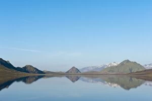 Reflection in the still lake, panoramic mountain landscape at Alftavatn lake, Laugavegur trekking route, Highlands