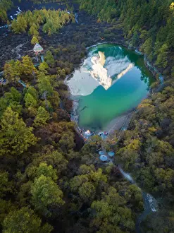 Tonnaja Travel Photography Prints: The reflection of snowy mountain on Zhuomala lake in Yading Nature Reserve, Sichuan