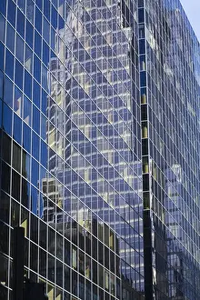 Office Prints: Reflections in a modern glass and steel office tower building, Montreal, Quebec, Canada