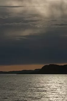 Surface Gallery: Reflections of the sun at dusk, Rodoyfjorden, Norway, Scandinavia, Europe