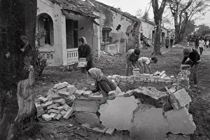 Refugees Building a Shelter after Attacks