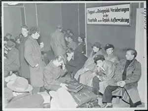 Refugees Gathered at Airport for Transport