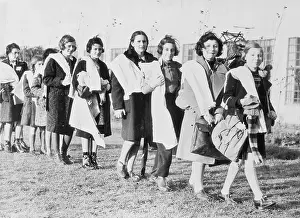Refugees Walking with Towels