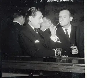 Reginald Gardiner Lighting Cigarette for Douglas Fairbanks Jr