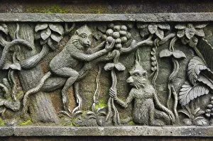 Relief with macaques at Monkey Forest temple, Pura Dalem Agung Padangtegal temple in the Ubud Monkey Forest, Ubud, Bali
