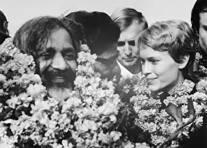 Religious Leader and Mia Farrow Arriving in India
