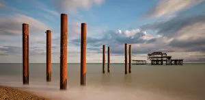 A fascinating collection of images featuring great British piers: Remains of Brighton's West Pier destroyed by fire