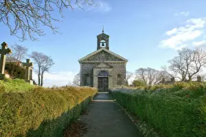 Prints of St Mary the Virgin, Glynde built in 1763 and quite different from anything else in the region being built in the Italian Renaissance style.Church path lined with frost covered hedges UK Travel Destinations Prints: Renaissance style church in England