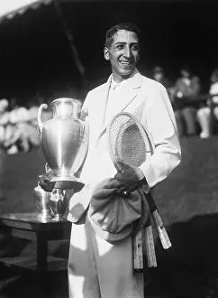Championship Prints: Rene Lacoste Holding Championship Cup