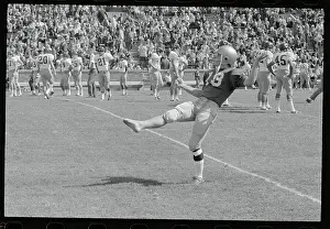 South Bend Prints: Rene Torrado in Football Kicking Action