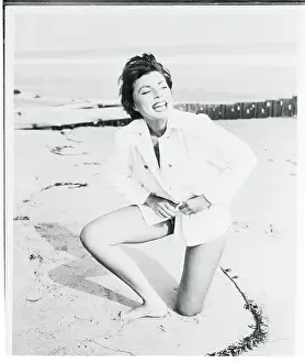 Renee Marshall Kneeling on Beach