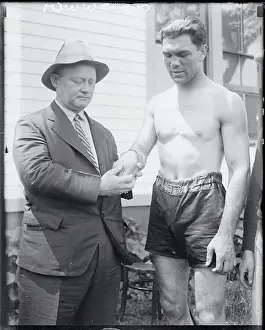 Reporter Inspecting Schmeling's Hand