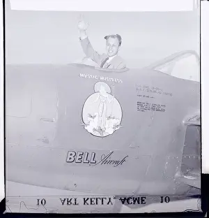 Schenectady Prints: Reporter Waving from Jet Plane Cockpit