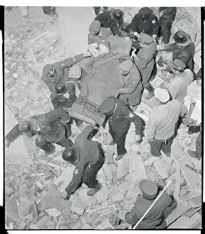Rescuers Carrying Injured Occupant