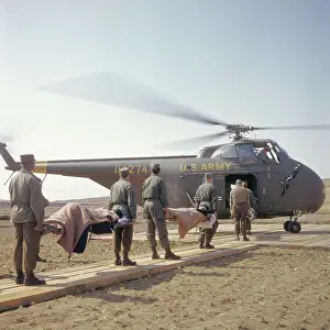 Rescuers Evacuating Sick and Wounded South Koreans by Helicopter
