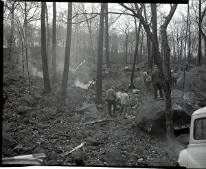 Wreckage Prints: Rescuers Search Through Plane Wreckage