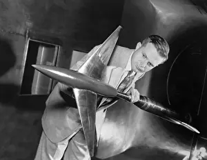 Research Scientist Examining a Model