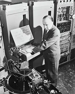 Harry F Prints: Researchers Operating Electronic Music Sythesizer