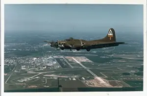Restoring Prints: Restored Military Plane In Flight