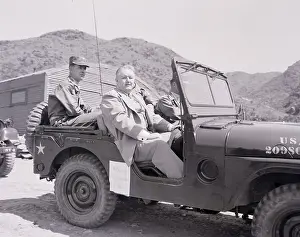 Reuben Robertson Jr. Riding in a Jeep