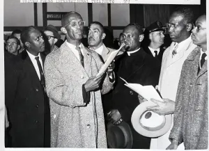 Prayer Prints: Rev. Mccollough At Airport Protest