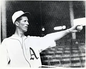 R.Grove Holding Ball Out In Front Of Him