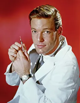 Red Background Prints: Richard Chamberlain as Dr. Kildare