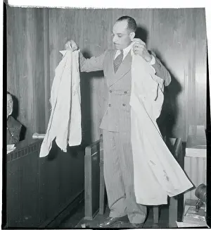 Witness Prints: Richard E. Daniel Displaying Bloody Clothing at Senate Hearing