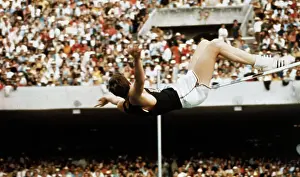 Richard Fosbury Jumping High Bar for Olympic Record