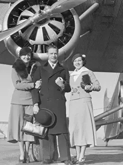 Richard Halliburton Posing with Two Women