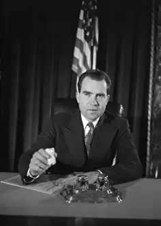 Richard M. Nixon Sitting Near American Flag