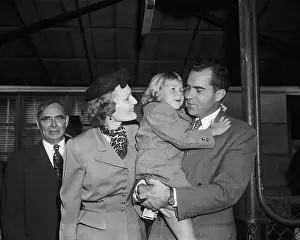 Joseph W Prints: Richard Nixon Hugging Daughter with Wife Watching