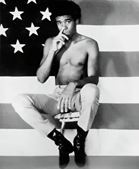 Richard Pryor In Front Of An American Flag