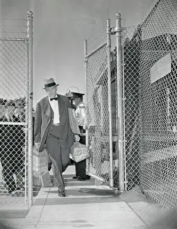 Exiting Prints: Richard Whitney Walking Through Prison Gates
