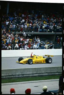 Rick Mears Driving and Raising Fist