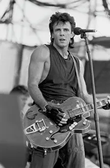 Iconic Concert Prints: Celebrate the Unforgettable Music Event That United the World: Rick Springfield At Live Aid