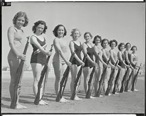 Long Beach Prints: Rifle Team Posing on Beach with Rifles
