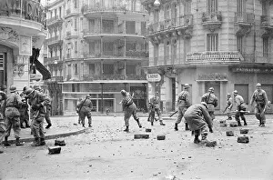 Rubble Prints: Riot Police in Street Quelling Riot