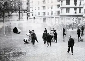 Hose Prints: Rioting Transport Workers Throw Barrel