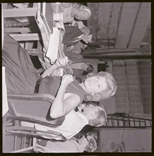Rita Hayworth Holding Glasses