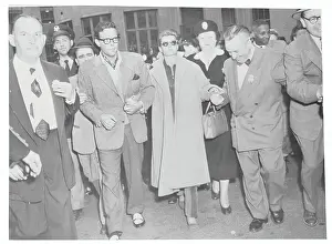 White Plains Prints: Rita Hayworth Leaving Court Building with Dick Haymes