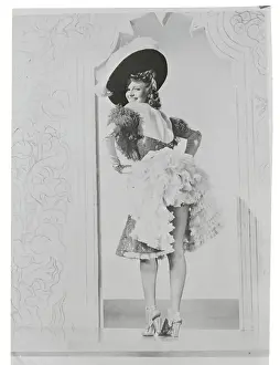 Rita Hayworth Lifting Her Skirt