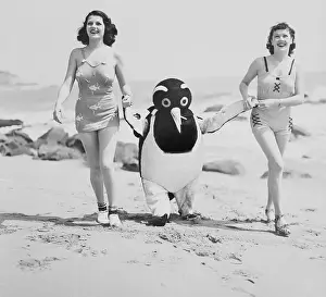 Rita Hayworth and Patricia Farr Strolling with Penguin